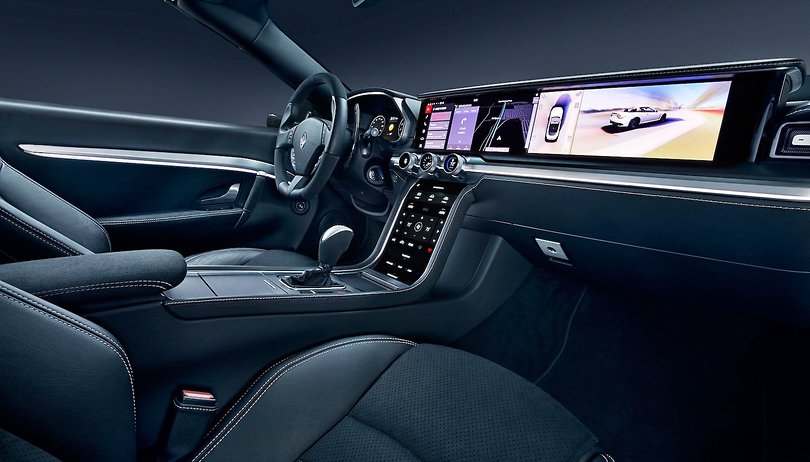 Behind the curtain, the autonomous car is driven by human sweat